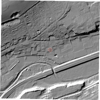 Shaded relief map of the ground around GU99PT, computed from Environment Agency LiDAR. The ground here sits at about 65 m above sea level and falls 41 m across the surrounding 800 m. Surface water reaching this point runs off ground lying to the north-west, 3.8 m higher.