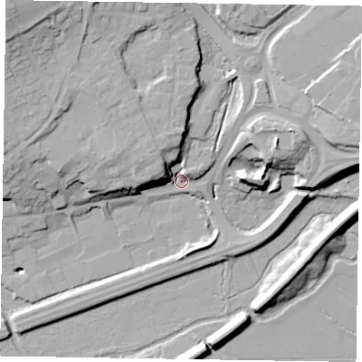 Shaded relief map of the ground around GU99PY, computed from Environment Agency LiDAR. The ground here sits at about 64 m above sea level and falls 28 m across the surrounding 800 m. Surface water reaching this point runs off ground lying to the north-north-west, 18.3 m higher.