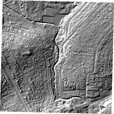 Shaded relief map of the ground around HA30TY, computed from Environment Agency LiDAR. The ground here sits at about 36 m above sea level and falls 17 m across the surrounding 800 m. Surface water reaching this point runs off ground lying to the north-east, 9.1 m higher.