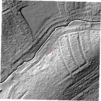 Shaded relief map of the ground around HA40TD, computed from Environment Agency LiDAR. The ground here sits at about 38 m above sea level and falls 11 m across the surrounding 800 m. Surface water reaching this point runs off ground lying to the south-east, 7.7 m higher.