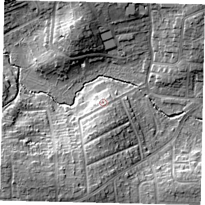 Shaded relief map of the ground around HA51BX, computed from Environment Agency LiDAR. The ground here sits at about 52 m above sea level and falls 17 m across the surrounding 800 m. Surface water reaching this point runs off ground lying to the south, 2.5 m higher.
