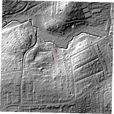 Shaded relief map of the ground around HA52SY, computed from Environment Agency LiDAR. The ground here sits at about 49 m above sea level and falls 18 m across the surrounding 800 m. Surface water reaching this point runs off ground lying to the south-south-west, 12.3 m higher.