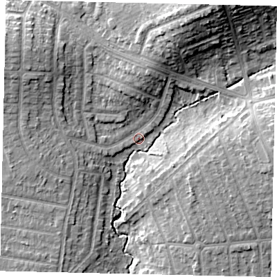 Shaded relief map of the ground around HA55LG, computed from Environment Agency LiDAR. The ground here sits at about 45 m above sea level and falls 18 m across the surrounding 800 m. Surface water reaching this point runs off ground lying to the north-west, 10.7 m higher.
