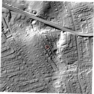 Shaded relief map of the ground around HA88HF, computed from Environment Agency LiDAR. The ground here sits at about 65 m above sea level and falls 19 m across the surrounding 800 m. Surface water reaching this point runs off ground lying to the west, 7.0 m higher.