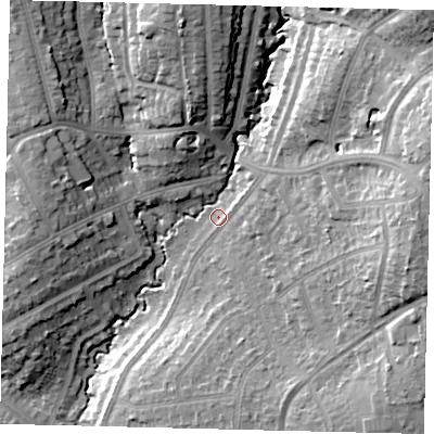 Shaded relief map of the ground around HA89LS, computed from Environment Agency LiDAR. The ground here sits at about 54 m above sea level and falls 23 m across the surrounding 800 m. Surface water reaching this point runs off ground lying to the east-north-east, 19.6 m higher.