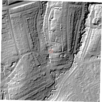 Shaded relief map of the ground around HA89PZ, computed from Environment Agency LiDAR. The ground here sits at about 59 m above sea level and falls 21 m across the surrounding 800 m. Surface water reaching this point runs off ground lying to the north-north-east, 13.6 m higher.