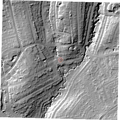 Shaded relief map of the ground around HA89TT, computed from Environment Agency LiDAR. The ground here sits at about 57 m above sea level and falls 20 m across the surrounding 800 m. Surface water reaching this point runs off ground lying to the north, 15.3 m higher.