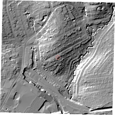 Shaded relief map of the ground around HA89UU, computed from Environment Agency LiDAR. The ground here sits at about 60 m above sea level and falls 16 m across the surrounding 800 m. Surface water reaching this point runs off ground lying to the south-west, 1.1 m higher.