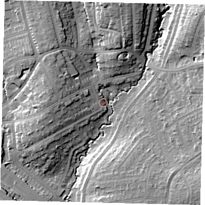 Shaded relief map of the ground around HA89UX, computed from Environment Agency LiDAR. The ground here sits at about 55 m above sea level and falls 19 m across the surrounding 800 m. Surface water reaching this point runs off ground lying to the west, 9.4 m higher.