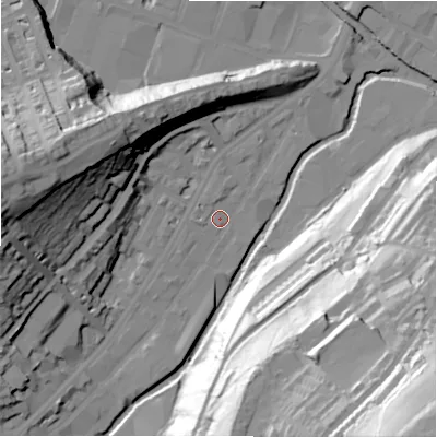 Shaded relief map of the ground around HD13QA, computed from Environment Agency LiDAR. The ground here sits at about 71 m above sea level and falls 88 m across the surrounding 800 m. Surface water reaching this point runs off ground lying to the west, 2.0 m higher.