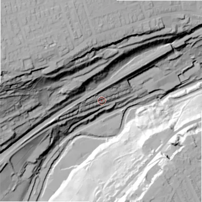 Shaded relief map of the ground around HD34QF, computed from Environment Agency LiDAR. The ground here sits at about 120 m above sea level and falls 104 m across the surrounding 800 m. Surface water reaching this point runs off ground lying to the west, 16.8 m higher.