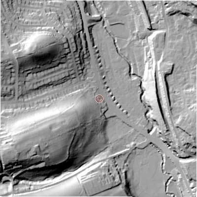 Shaded relief map of the ground around HD58RL, computed from Environment Agency LiDAR. The ground here sits at about 77 m above sea level and falls 56 m across the surrounding 800 m. Surface water reaching this point runs off ground lying to the south-west, 28.9 m higher.