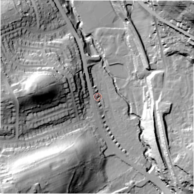 Shaded relief map of the ground around HD58RP, computed from Environment Agency LiDAR. The ground here sits at about 74 m above sea level and falls 70 m across the surrounding 800 m. Surface water reaching this point runs off ground lying to the west, 38.1 m higher.