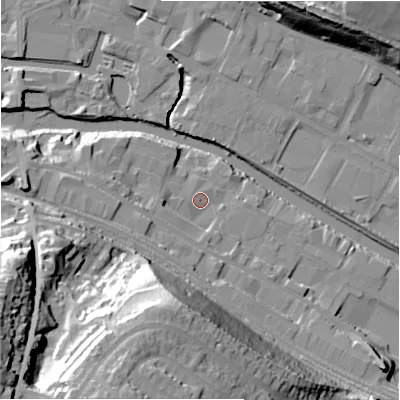 Shaded relief map of the ground around HD61LT, computed from Environment Agency LiDAR. The ground here sits at about 57 m above sea level and falls 52 m across the surrounding 800 m. Surface water reaching this point runs off ground lying to the west, 7.9 m higher.