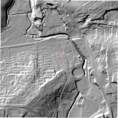Shaded relief map of the ground around HG12BB, computed from Environment Agency LiDAR. The ground here sits at about 70 m above sea level and falls 39 m across the surrounding 800 m. Surface water reaching this point runs off ground lying to the south-south-west, 15.6 m higher.