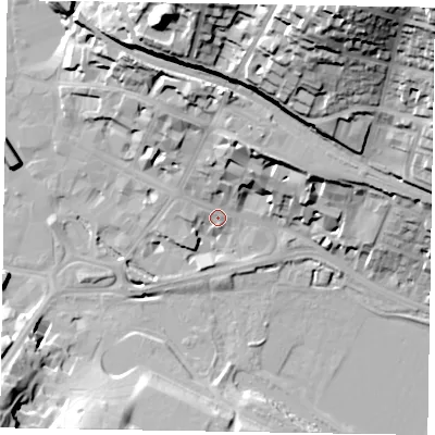 Shaded relief map of the ground around HP111LT, computed from Environment Agency LiDAR. The ground here sits at about 69 m above sea level and falls 55 m across the surrounding 800 m. Surface water reaching this point runs off ground lying to the north, 18.5 m higher.