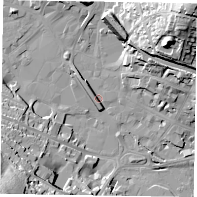 Shaded relief map of the ground around HP112AU, computed from Environment Agency LiDAR. The ground here sits at about 69 m above sea level and falls 63 m across the surrounding 800 m. Surface water reaching this point runs off ground lying to the north-east, 48.7 m higher.