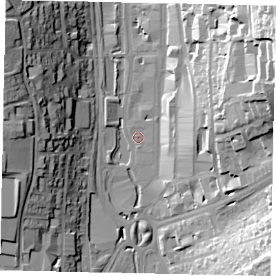 Shaded relief map of the ground around HP11DH, computed from Environment Agency LiDAR. The ground here sits at about 82 m above sea level and falls 43 m across the surrounding 800 m. Surface water reaching this point runs off ground lying to the east-north-east, 35.9 m higher.