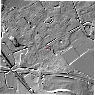 Shaded relief map of the ground around HP180FG, computed from Environment Agency LiDAR. The ground here sits at about 74 m above sea level and falls 13 m across the surrounding 800 m. Surface water reaching this point runs off ground lying to the south-south-east, 7.4 m higher.
