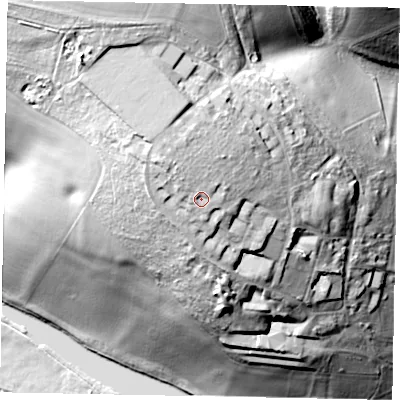 Shaded relief map of the ground around HP51UE, computed from Environment Agency LiDAR. The ground here sits at about 129 m above sea level and falls 57 m across the surrounding 800 m. Surface water reaching this point runs off ground lying to the north-north-west, 4.5 m higher.