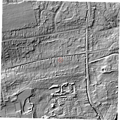 Shaded relief map of the ground around HU107DR, computed from Environment Agency LiDAR. The ground here sits at about 13 m above sea level and falls 16 m across the surrounding 800 m. Surface water reaching this point runs off ground lying to the west-south-west, 8.3 m higher.