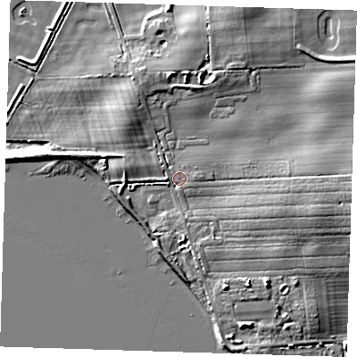 Shaded relief map of the ground around HU120UE, computed from Environment Agency LiDAR. The ground here sits at about 4 m above sea level and falls 7 m across the surrounding 800 m. Surface water reaching this point runs off ground lying to the west, 2.4 m higher.