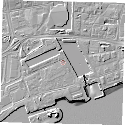 Shaded relief map of the ground around HU12DQ, computed from Environment Agency LiDAR. The ground here sits at about 5 m above sea level and falls 15 m across the surrounding 800 m. The ground contributing surface water to this point lies to the south-south-east.