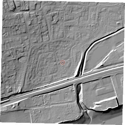 Shaded relief map of the ground around HU130DU, computed from Environment Agency LiDAR. The ground here sits at about 4 m above sea level and falls 21 m across the surrounding 800 m. Surface water reaching this point runs off ground lying to the west, 10.7 m higher.