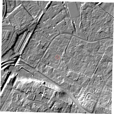 Shaded relief map of the ground around HU89XE, computed from Environment Agency LiDAR. The ground here sits at about 0 m above sea level and falls 12 m across the surrounding 800 m. Surface water reaching this point runs off ground lying to the south-south-east, 10.1 m higher.