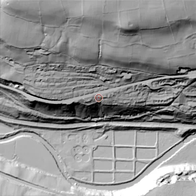 Shaded relief map of the ground around HX26BE, computed from Environment Agency LiDAR. The ground here sits at about 133 m above sea level and falls 139 m across the surrounding 800 m. Surface water reaching this point runs off ground lying to the north, 80.4 m higher.