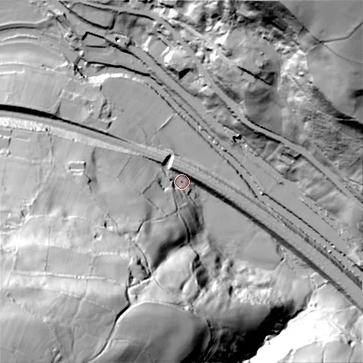 Shaded relief map of the ground around HX26JA, computed from Environment Agency LiDAR. The ground here sits at about 90 m above sea level and falls 113 m across the surrounding 800 m. Surface water reaching this point runs off ground lying to the south-west, 110.8 m higher.