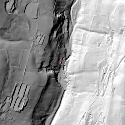 Shaded relief map of the ground around HX26ST, computed from Environment Agency LiDAR. The ground here sits at about 123 m above sea level and falls 137 m across the surrounding 800 m. Surface water reaching this point runs off ground lying to the west-north-west, 51.7 m higher.
