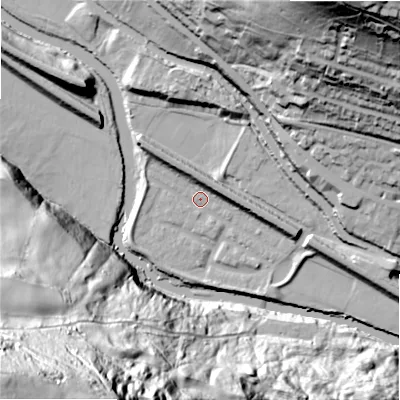 Shaded relief map of the ground around HX30UH, computed from Environment Agency LiDAR. The ground here sits at about 70 m above sea level and falls 128 m across the surrounding 800 m. Surface water reaching this point runs off ground lying to the north-west, 8.9 m higher.