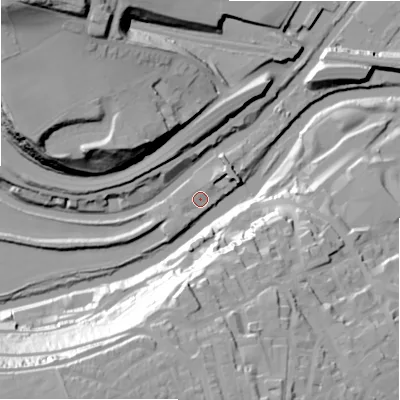 Shaded relief map of the ground around HX50SG, computed from Environment Agency LiDAR. The ground here sits at about 65 m above sea level and falls 64 m across the surrounding 800 m. Surface water reaching this point runs off ground lying to the north-east, 3.3 m higher.