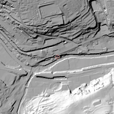 Shaded relief map of the ground around HX62AS, computed from Environment Agency LiDAR. The ground here sits at about 77 m above sea level and falls 101 m across the surrounding 800 m. Surface water reaching this point runs off ground lying to the south-south-east, 84.0 m higher.