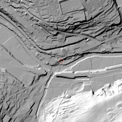 Shaded relief map of the ground around HX62EE, computed from Environment Agency LiDAR. The ground here sits at about 79 m above sea level and falls 104 m across the surrounding 800 m. Surface water reaching this point runs off ground lying to the north, 9.6 m higher.