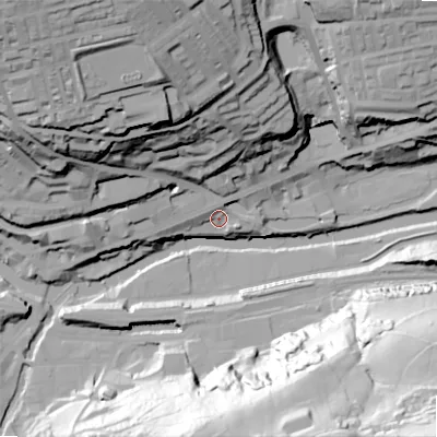 Shaded relief map of the ground around HX62FE, computed from Environment Agency LiDAR. The ground here sits at about 82 m above sea level and falls 92 m across the surrounding 800 m. Surface water reaching this point runs off ground lying to the north, 5.6 m higher.