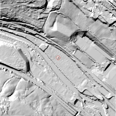 Shaded relief map of the ground around HX62FP, computed from Environment Agency LiDAR. The ground here sits at about 76 m above sea level and falls 118 m across the surrounding 800 m. Surface water reaching this point runs off ground lying to the north-west, 1.6 m higher.