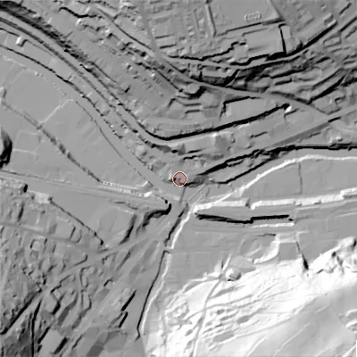 Shaded relief map of the ground around HX62QD, computed from Environment Agency LiDAR. The ground here sits at about 80 m above sea level and falls 94 m across the surrounding 800 m. Surface water reaching this point runs off ground lying to the north, 62.6 m higher.