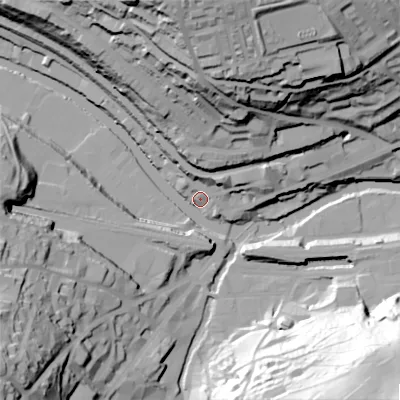 Shaded relief map of the ground around HX62QG, computed from Environment Agency LiDAR. The ground here sits at about 79 m above sea level and falls 85 m across the surrounding 800 m. Surface water reaching this point runs off ground lying to the north, 65.8 m higher.