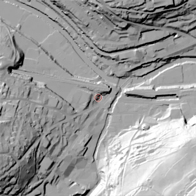 Shaded relief map of the ground around HX63AJ, computed from Environment Agency LiDAR. The ground here sits at about 80 m above sea level and falls 105 m across the surrounding 800 m. Surface water reaching this point runs off ground lying to the north-west, 6.1 m higher.