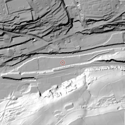 Shaded relief map of the ground around HX63LD, computed from Environment Agency LiDAR. The ground here sits at about 76 m above sea level and falls 106 m across the surrounding 800 m. Surface water reaching this point runs off ground lying to the south-south-west, 8.6 m higher.