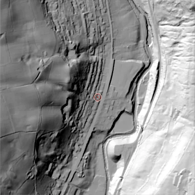 Shaded relief map of the ground around HX64AG, computed from Environment Agency LiDAR. The ground here sits at about 124 m above sea level and falls 118 m across the surrounding 800 m. Surface water reaching this point runs off ground lying to the west-south-west, 84.7 m higher.
