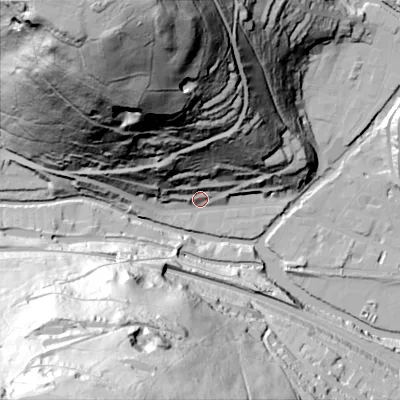 Shaded relief map of the ground around HX76AQ, computed from Environment Agency LiDAR. The ground here sits at about 103 m above sea level and falls 149 m across the surrounding 800 m. Surface water reaching this point runs off ground lying to the north-north-east, 48.3 m higher.