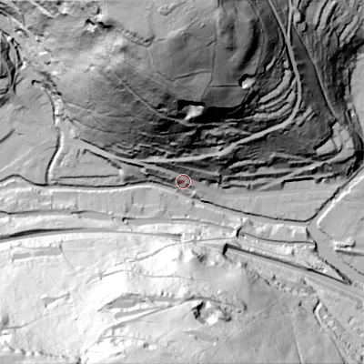 Shaded relief map of the ground around HX76AT, computed from Environment Agency LiDAR. The ground here sits at about 106 m above sea level and falls 148 m across the surrounding 800 m. Surface water reaching this point runs off ground lying to the north, 145.8 m higher.