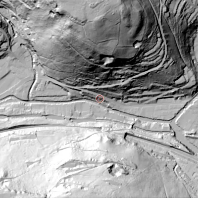 Shaded relief map of the ground around HX76AX, computed from Environment Agency LiDAR. The ground here sits at about 106 m above sea level and falls 148 m across the surrounding 800 m. Surface water reaching this point runs off ground lying to the north, 145.8 m higher.