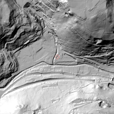 Shaded relief map of the ground around HX76BT, computed from Environment Agency LiDAR. The ground here sits at about 104 m above sea level and falls 149 m across the surrounding 800 m. Surface water reaching this point runs off ground lying to the north-north-east, 145.6 m higher.