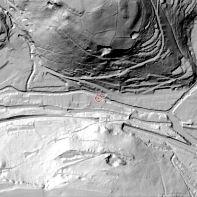 Shaded relief map of the ground around HX76EA, computed from Environment Agency LiDAR. The ground here sits at about 99 m above sea level and falls 145 m across the surrounding 800 m. Surface water reaching this point runs off ground lying to the north, 142.8 m higher.