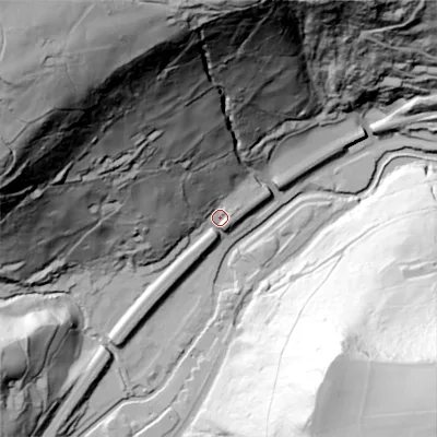 Shaded relief map of the ground around HX76PN, computed from Environment Agency LiDAR. The ground here sits at about 114 m above sea level and falls 162 m across the surrounding 800 m. Surface water reaching this point runs off ground lying to the north-west, 154.5 m higher.