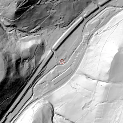 Shaded relief map of the ground around HX76PT, computed from Environment Agency LiDAR. The ground here sits at about 110 m above sea level and falls 143 m across the surrounding 800 m. Surface water reaching this point runs off ground lying to the north-west, 116.4 m higher.